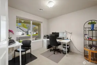 3rd bedroom/office with view of porch