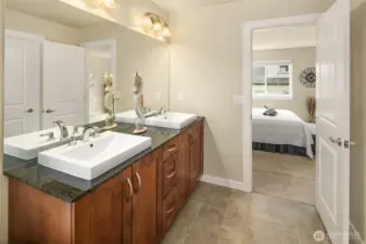 Dual sink vanity in bathroom the primary bathroom.