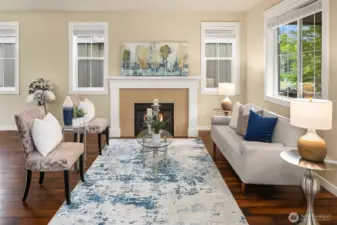 A cozy fireplace in the living room creates the perfect ambiance for relaxing or entertaining.