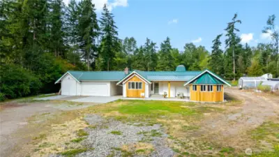The exterior of the home has been completely refreshed and offers a blank slate for any home gardener with 1.27 acres to enjoy!