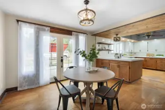 Dining room with French doors to the back patio.