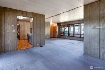 Living and Dining rooms are open and airy.  Dining connects to kitchen