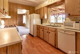 Galley Kitchen has lots of light and looks out onto the back deck and yard.