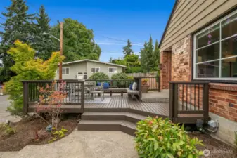Lovely curved entrance to the freshly painted deck w/views of Lk WA