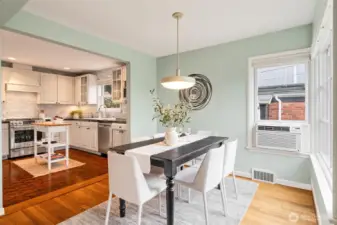 Talk to your dinner guests while cooking in the kitchen...and AC unit comes with the house