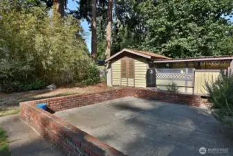 Plenty of space for your outdoor furniture. Come create your own oasis. Garden shed with additional covered area for storing your beach toys and extra gardening supplies.
