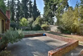 Another view of your spacious level fenced yard.