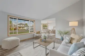 Large windows, soaring ceilings, and LVP floring throughout.