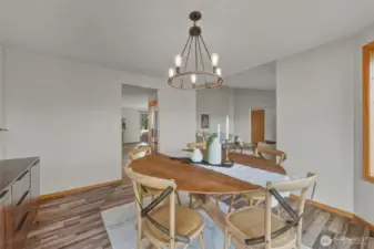 Updated light fixtures appoint both this formal dining room, and also the informal dining space off the kitchen (which you'll get to see in the photos that follow).