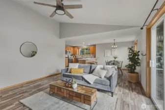 Back into the family room, looking at the kitchen and spacious breakfast nook.