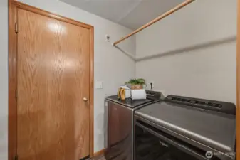 Here is the laundry room, looking toward the door to the large 2-car garage.