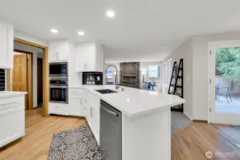 Picture of new quartz counter, with nice workspace & overhang and quality sink. New dishwasher.