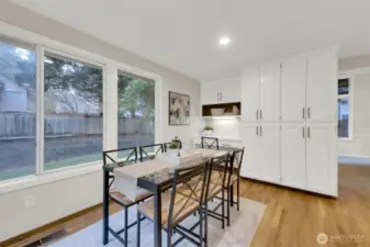 Large informal eating area. Work station and pantry cabinets.