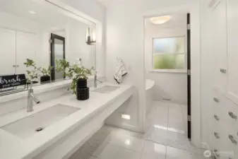 Floating dual vanity with custom cabinets for ample storage