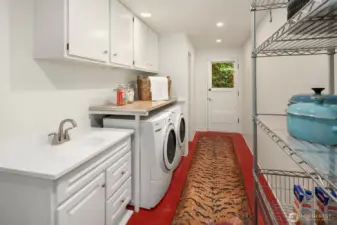 Large laundry room with half-bath and Marmoleum floors