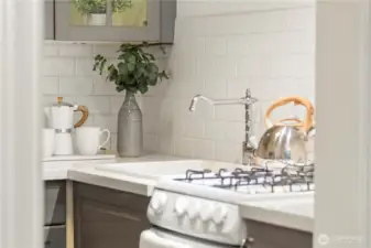 Gas range and subway tile