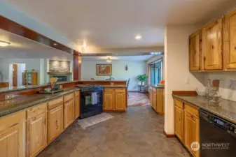 The kitchen is roomy and has granite countertops.