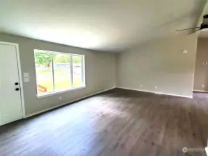 Very spacious living room with vaulted ceilings throughout.