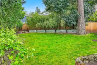 Plenty of space in the back yard to expand the garden or add a play set!
