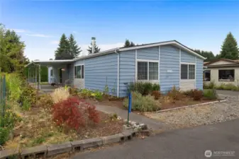 Meticulous landscaping surrounding home.