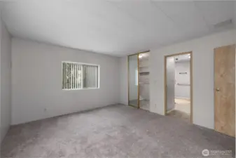 View from primary bedroom into primary en-suite bathroom and large walk in closet!