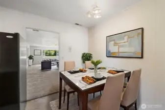 Cozy eating area adjacent to kitchen.