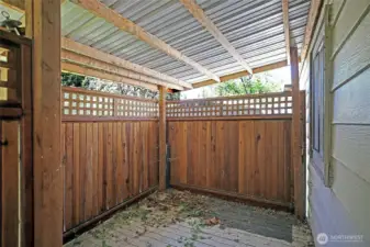 Private covered patio, for you to sit back and relax, so much potential for making this space a perfect oasis!