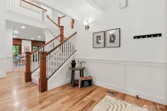 Featuring beautiful hardwood floors and classic spindle railing—blending warmth, charm, and function in this versatile space.