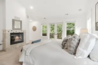 Retreat to your private sanctuary with fireplace, spa-inspired 5-piece bath, and deck access.