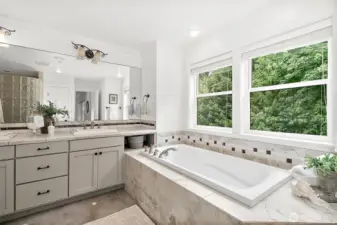 Bathed in natural light, this spa-inspired bath offers luxury and serenity in every detail.