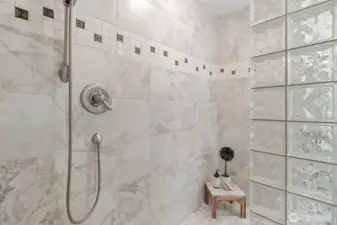 Spacious and beautifully designed, this doorless shower combines modern style with everyday comfort.