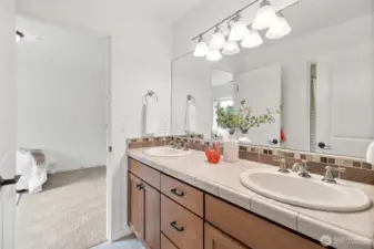 Sleek and stylish design featuring dual sinks for convenience and contemporary flair.