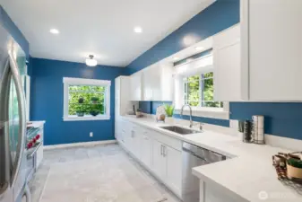Great light including above the sink and a large bay window for herbs and greenery.