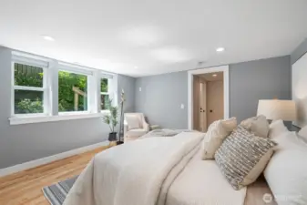 The lower level primary is spacious with great light out to the private side yard.