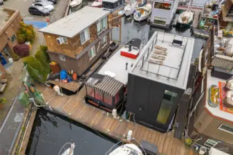 Larger Homes Next Door Have Been Developed in Same Size Slip