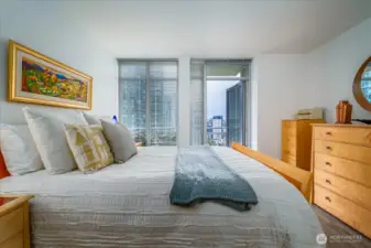 Primary bedroom with deck and beautiful views