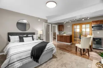Microwave, cabinetry, and mini fridge truly makes for the best multi functional space!