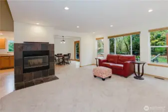 Walls of windows brighten the living space.