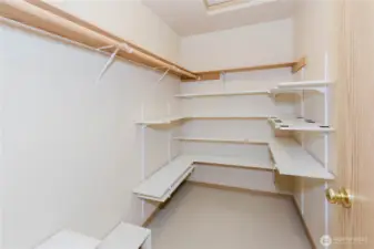 Primary walk-in closet.