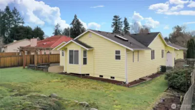 Backyard view, fully fenced and private, slab ready for your shed of choice.