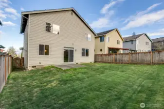 Fully fenced back yard.  Room for garden, bbq, play, and entertaining.