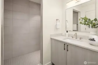 3/4 ensuite bath connected to lower level guest suite.