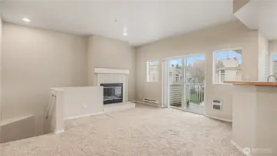 A spacious and inviting living room, complete with fireplace for cozy evenings.