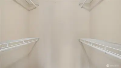 Primary bedroom boasts a walk-in closet.