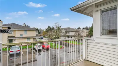 Step onto the private deck, offering a seamless indoor-outdoor living experience.