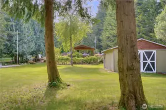 The property stretches beautifully from shop to house, giving a storybook view through the trees of your homestead haven.