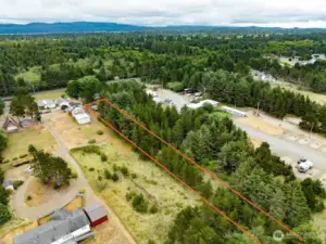 Westside 2 bedroom cabin with property to the Western Upland Boundary. Just a short walk to the beach