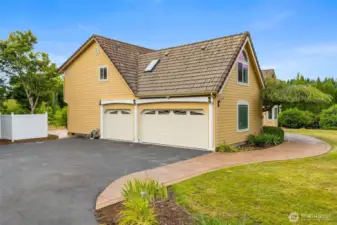 3 car attached garage w/ample parking. 4th bay is at rear of home w/seperate driveway
