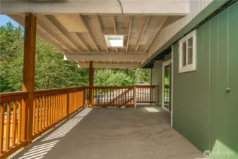 Huge covered back deck and views to the backyard