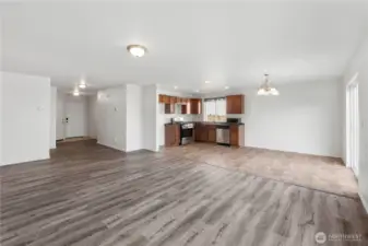 Large living room opens up to dining room and kitchen